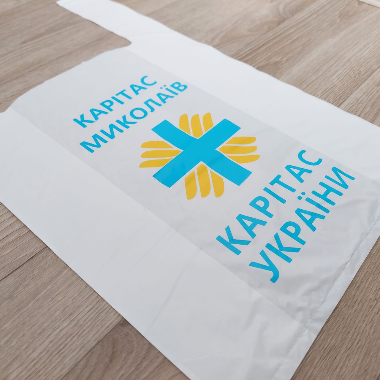 T-shirt bag with a logo 40х16х60cm (15.7x6.3x23.6in) White
